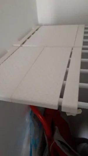 Planche de rangement ajustable
